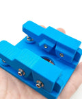 Super Cool Qinkyh Welding Wire Fixture And Soldering Table Clamp That Lets You Handle Any Diameter From 0.3 To 8mm With Ease, blue holder in hand.