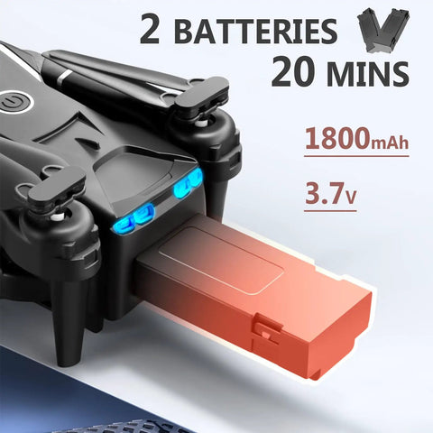 Close-up of Shark Shaped Mini Drone battery insertion, highlighting 1800mAh capacity and 3.7V specification.