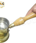 Hand Hammered Brass Copper Ibrik Coffee Pot For Turkish Greek Coffee Maker With Wooden Handle 140 Ml No 3 shown in hand