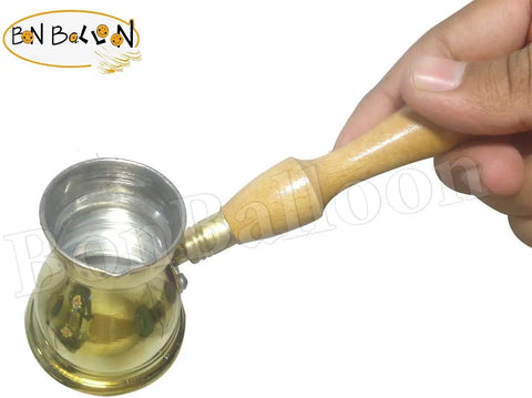 Hand Hammered Brass Copper Ibrik Coffee Pot For Turkish Greek Coffee Maker With Wooden Handle 140 Ml No 3 shown in hand