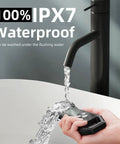 Ultra Fast IPX7 Waterproof Meat Thermometer being washed under running water, showing its durability and design.