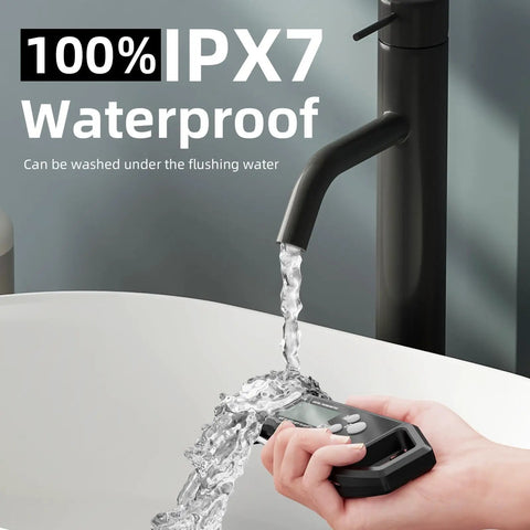 Ultra Fast IPX7 Waterproof Meat Thermometer being washed under running water, showing its durability and design.
