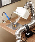 Heavy Duty Desktop Smoke Absorber For Soldering With Flexible Hose extracting fumes from soldering on a workstation.