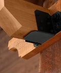 Ironwood 6 To 8 Inch Beam Hanger Flush Steel, Black Powder Coated, attached to treated lumber in outdoor deck support.
