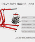 Badass Heavy Duty Folding Engine Hoist Crane With Six Swivel Casters lifting a steel engine, showcasing red steel frame and ease of use.