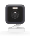 Front view of 2K Indoor Outdoor WiFi Security Camera with Color Night Vision Edge AI Integrated Spotlight and Siren in white.