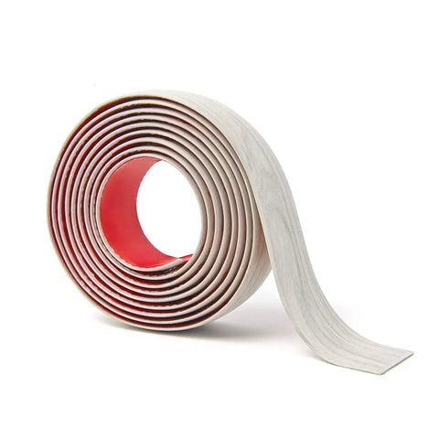 Self Adhesive Vinyl Floor Transition Strip For Laminate And Tile Floors A Flat Divider To Join Gaps And Create A Clean Carpet Threshold Look White Washed Four Feet Long One Point Five Seven Inch Wide Scratch Dirt Resistant Easy Peel And Stick rolled