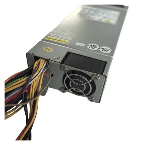 Beefy 200W Industrial Control Power Supply FSP200-601U For Reliable Machine Power And Smooth DC Output In Harsh Environments With Industrial Grade Durability Wide Input Range And Protective Features, gray metal unit with wired output