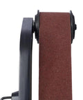 Close-up of the sanding belt on a Powerful 1300W Pipe Belt Sander With Variable Speed Control for polishing metal rust.