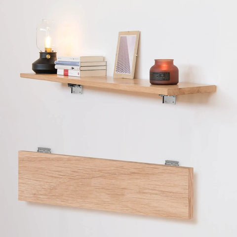 Heavy Duty Folding Brackets For Table Legs And Wall Shelves With Self Locking Hinges Rating Up To 330 Pounds Each mounted holding a wooden shelf.