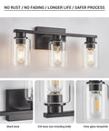 Sleek Matte Black 3 Light Vanity Light With Clear Glass Shades For Bathroom, showing full fixture with glowing bulbs