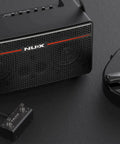 Close-up view of 30W Wireless Modeling Guitar Amplifier with Built In IRs, featuring control panel and part of guitar.