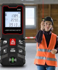 Pro Laser Distance Meter 60M Sick Precision Digital Measure Tool in use, displaying measurements, with user wearing safety gear.