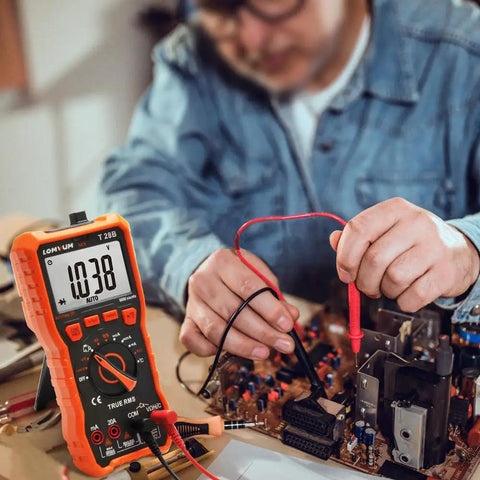 Auto Ranging Digital Multimeter For DIYers With 6000 Counts For AC DC Voltage And Current Resistance Capacitance Diode Test NCV Duty Cycle And Type K Thermocouple Probe For Quick Home And Auto Electrical Fixes in use for circuit testing