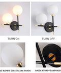 Two Light Globe Wall Sconce With Frosted Glass Globes, Mid Century Modern Vibe, cozy bedroom hallway bathroom lighting, on and off