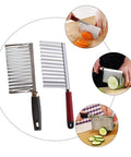 SHOWERORO 2pcs stainless steel wavy potato cutters with ergonomic handles for slicing vegetables.