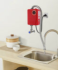 Sleek Red Instant Tankless Electric Water Heater, 3000W On Demand Wall Mount Unit above stainless steel sink.