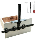 Rock Solid Aluminum Cabinet Handle Jig With Integrated Center Punch For Drawer Pull Layout showing alignment with ruler on a wooden drawer.