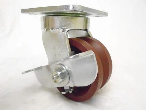 4 Inch Swivel Caster With Burgundy Ductile Steel Wheel And 7/8 Inch V Groove Offers 1500 Lbs Capacity side view with locking brake.