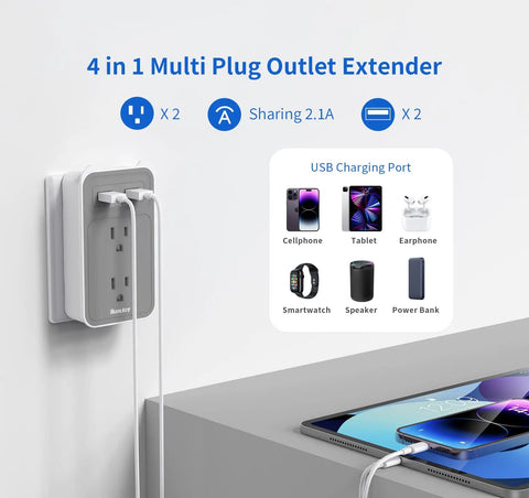 4 In 1 Outlet Extender With Phone Cradle, Dual AC Outlets And 3 USB Ports, shown on wall with charging devices