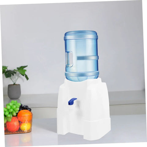 Portable Water Dispenser And Compact Bucket Holder Faucet For Outdoor Camping And RV Use on a kitchen countertop.