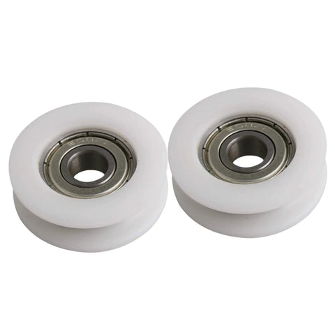Four Pc U Groove Pom Pulleys With Eight mm Bore And 34 mm Outer Diameter, white POM wheels with double shielded bearings.