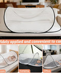 Large Pop Up Mosquito Tent For Adults on a sofa, demonstrating portability and multi-use in bedroom, camping, and office settings.
