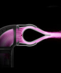 Pink airflow illustration through Blade Concentrator For Airwrap Styling Tool With Focused Airflow To Style One Section At A Time Without Disturbing The Rest Pro Grade And Compatible With All Airwrap Generations.
