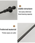Black Wrought Iron Stair Handrail Wall Mounted Indoor Outdoor Support Bar With Kickass Ergonomic Grip Built Tough For Daily Use Senior Safety Adjustable Length Weather Resistant, close-up on stable structure.