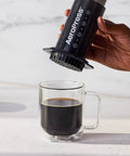 All In One French Press Pour Over And Espresso Style Manual Brewer For Quick 2 Minute Brews With Rich Flavor in use over mug