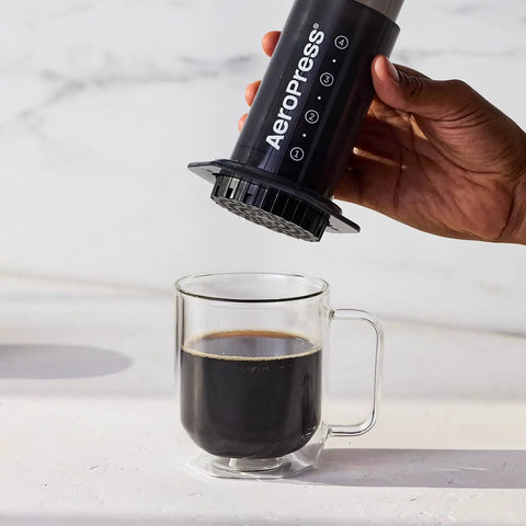All In One French Press Pour Over And Espresso Style Manual Brewer For Quick 2 Minute Brews With Rich Flavor in use over mug