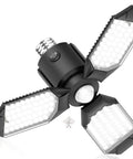 Motion Sensor Garage Light Ultra Bright 8000LM 6500K Shop Light With 3 Modes Auto On Off PIR Detection 360 Degree Coverage Detects Movement Up To 15 Feet Perfect For Garage, Shop, And Driveway. Black four-head LED garage light with PIR sensor and 360° coverage