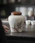 Top Tier Ceramic Loose Tea Storage Jar With Secure Lid Perfect For Keeping Coffee Beans Spices Nuts And Candy Legit Fresh on kitchen counter.