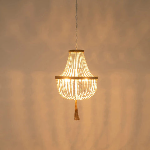 Four Light Wood Beaded Boho Farmhouse Pendant Chandelier With Tassels In White Rustic Bohemia Style, lit and hanging