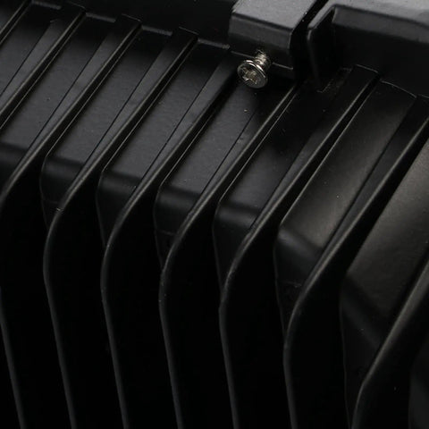 Close-up of JUDYSSY Bright Led Floodlight 30W-600W ribbed aluminum housing, showcasing durable construction and design.