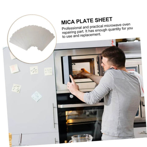 6Pcs Mica Sheet Thermal Pad Kit for microwave oven repair and waveguide cover installation, man working on a microwave