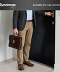 Man in business attire opening a door, holding a briefcase, showcasing a modern entrance for home use.