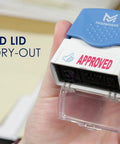 Zero Sweat Paperwork Processing With This Dead Simple Pre Inked Office Approval Stamp, compact with an attached lid for moisture protection.