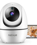 1080P Indoor Pet Cam With 2 Way Audio Night Vision And AI Human Detection 2.4GHz WiFi Home Security Cam next to phone showing dog image