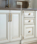 5 Inch Hole Center Antique Brass Cabinet Pulls Zinc Alloy Kitchen Drawer Pulls 6 Pack installed on white kitchen cabinets
