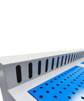 Heavy Duty Metalworking Downdraft Table Dust Collector With Side Suction For Shop Fine Dust Capture And Multi Stage Filtration That Straight Up Kicks Serious Workshop Mess To The Curb Effortlessly side suction plate and perforated blue worktop close-up