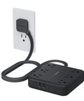 Heavy Duty Surge Protector Power Strip With An Incredibly Flat Plug 5 Foot Extension Cord In Black mounted on wall.