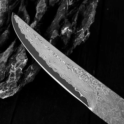 Close-up of Ultra Sharp Meat Cleaver For DIY Damascus Steel Blank Blade Knife Kit showing Damascus pattern on blade edge.