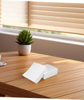 Heavy Duty 600 Count Dustless Lab Wipes For Camera Lenses And Precision Gear Oil Absorbent Cleanroom Cleaning Pads on wooden table.