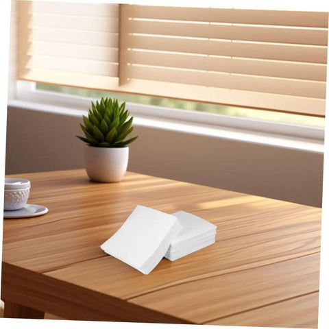 Heavy Duty 600 Count Dustless Lab Wipes For Camera Lenses And Precision Gear Oil Absorbent Cleanroom Cleaning Pads on wooden table.