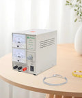 3A Electroplating Machine For Jewelry, 110V Pro Grade Gold And Silver Plating Power Supply with dials and jewelry on table.
