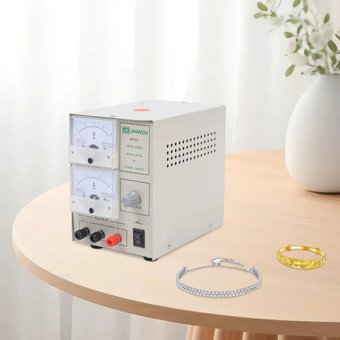 3A Electroplating Machine For Jewelry, 110V Pro Grade Gold And Silver Plating Power Supply with dials and jewelry on table.