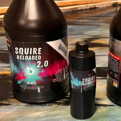 Squire Two Zero Reloaded Pro Grade Sealer For Concrete Epoxy Natural Stone Vct Lvt Lvp Tile And Grout Substrates With Gloss Finish One Quart Coverage Up To 250 Sqft displayed in large and small bottles.