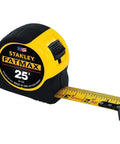 24-Pack FatMax Tape Measure 25 Ft with 1-1/4 Inch Blade, BladeArmor Coating, extended on table surface