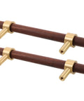 Walnut Cabinet Pulls Set 2 Pack Modern Long Handles for Kitchen and Bathroom Cabinets made of dark brown wood with gold accents.